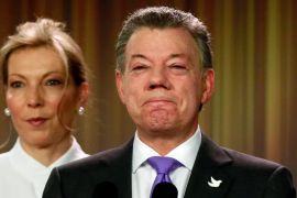 Santos addresses the media next to his wife after winning the Nobel Peace Prize, at Narino Palace in Bogota, Colombia [REUTERS]