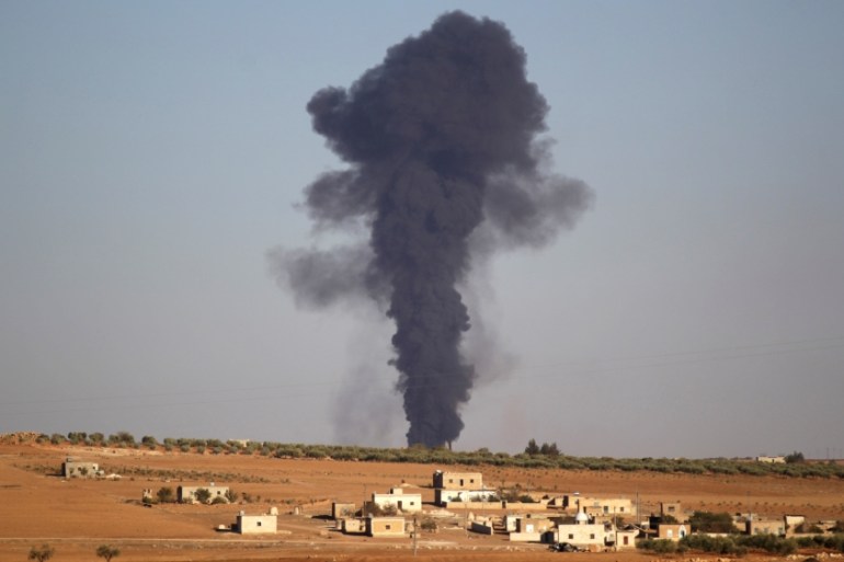 Smoke rises from al-Bab city, northern Aleppo province, Syria [REUTERS]