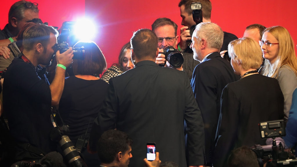 Jeremy Corbyn is surrounded by media after being announced as the leader of the Labour Party in September 2016 in Liverpool, England [Christopher Furlong/Getty Images]