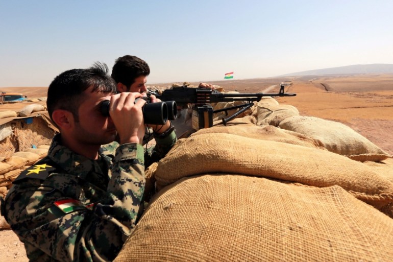 Iraqi Kurdish Peshmerga fighters near Mosul