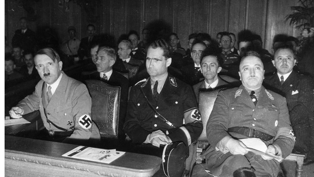 Nazi leaders Adolf Hitler and Rudolph Hess during the Congress of National Labour in Berlin, 1935 [Photo by © Hulton-Deutsch Collection/CORBIS/Corbis via Getty Images]