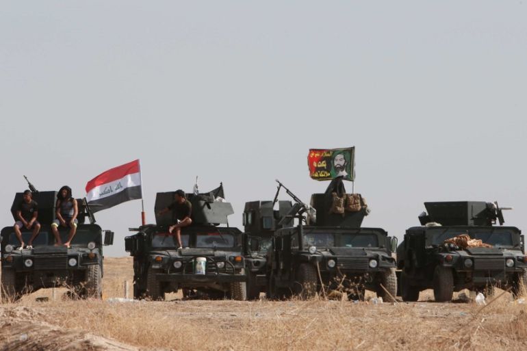 Iraqi security forces gather on the east of Mosul during preparations to attack Mosul, Iraq [REUTERS]