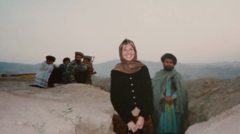 Julie Sirrs, former officer at the Defense Intelligence Agency, on one of her research missions to Afghanistan [Al Jazeera]