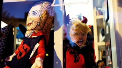 Dolls depicting Donald Trump and Hillary Clinton in Washington DC [Getty]
