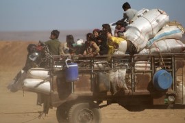 People that fled ISIL-controlled areas arrive at a rebel controlled area in northern Aleppo countryside, Syria [REUTERS]