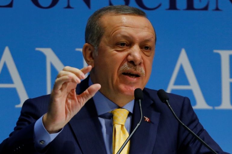 Turkish President Erdogan addresses the audience during a meeting in Ankara