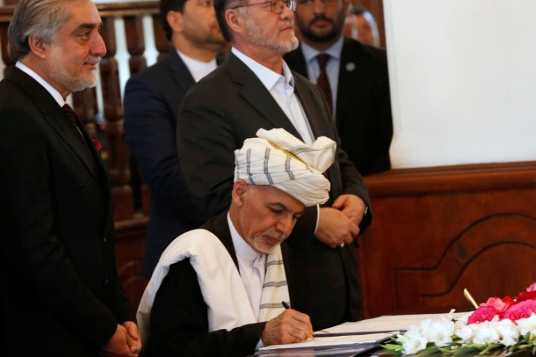 Afghan President Ashraf Ghani, signs a peace agreement with Hizb-i-Islami, led by Gulbuddin Hekmatyar, in Kabul