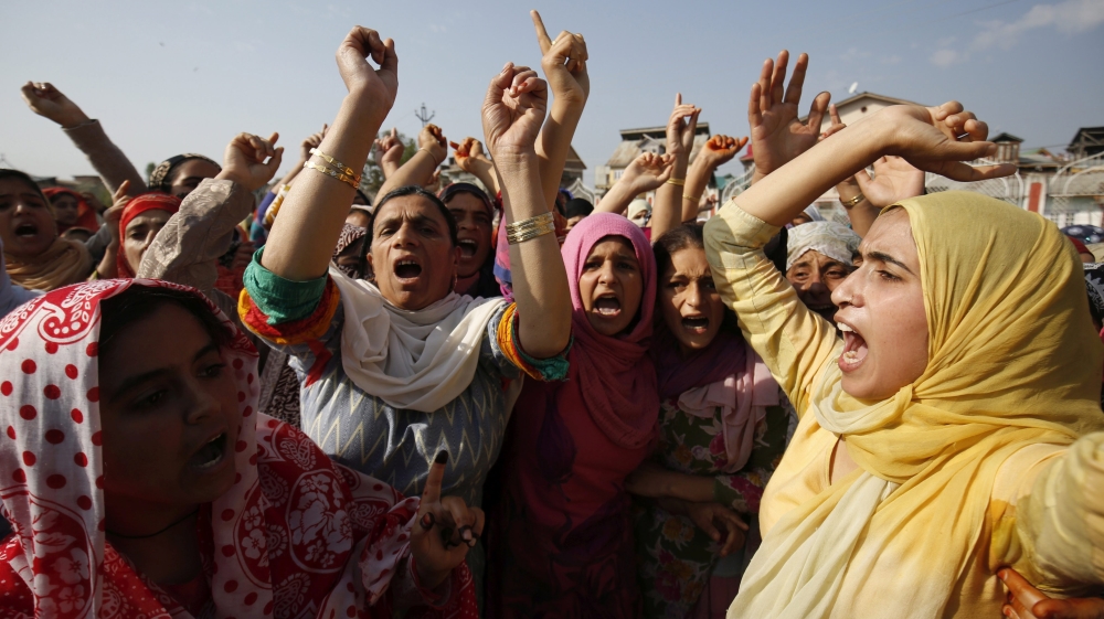 Kashmiri Muslim women shout slogans during the funeral procession in Srinagar [EPA]