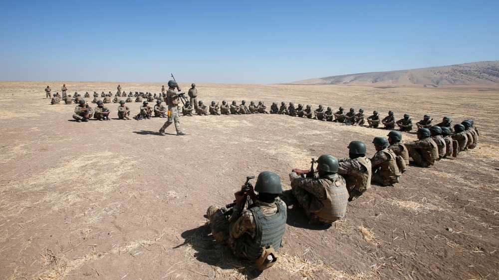 Turkey has been training Sunni forces in the Bashiqa Camp in northern Iraq [Thaier Al-Sudani/Reuters]