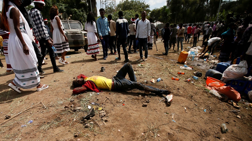 File: An injured protester in October waits for help in Oromia region [Tiksa Negeri/Reuters]