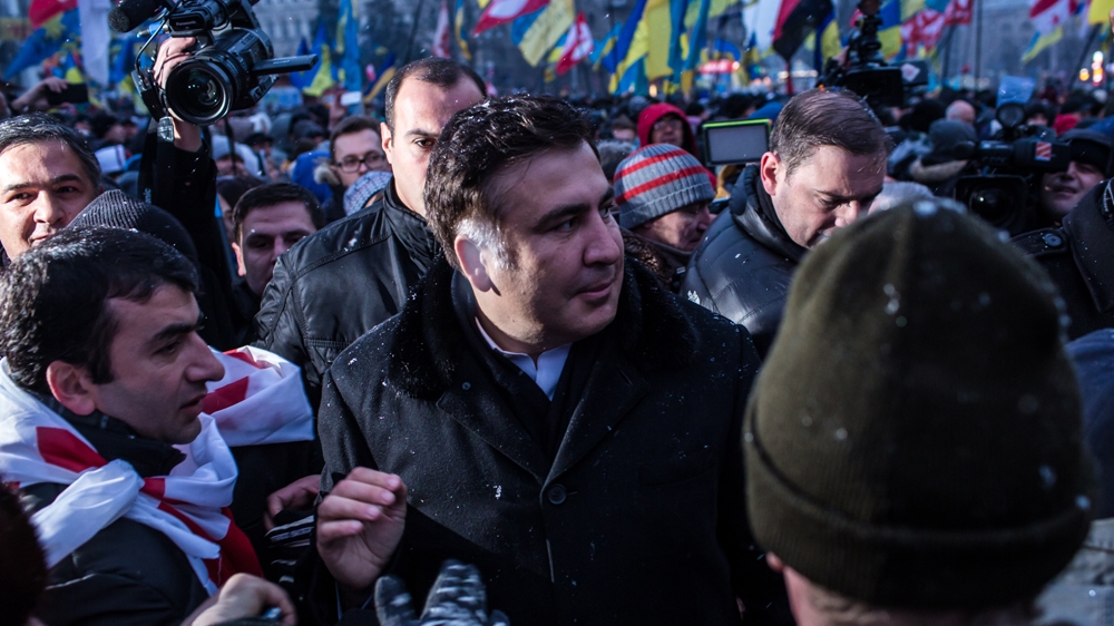  Mikheil Saakashvili, the former president of Georgia, arrives on Independence Square in support of anti-government protesters in Kiev [Brendan Hoffman/Getty Images]