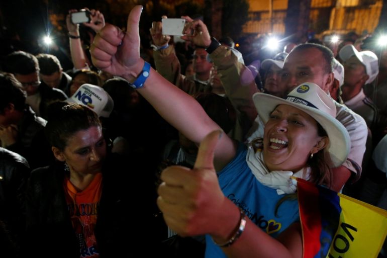 Supporters of "No" vote celebrate after the nation voted "NO" in a referendum on a peace deal between the government and FARC rebels in Bogota, Colombia