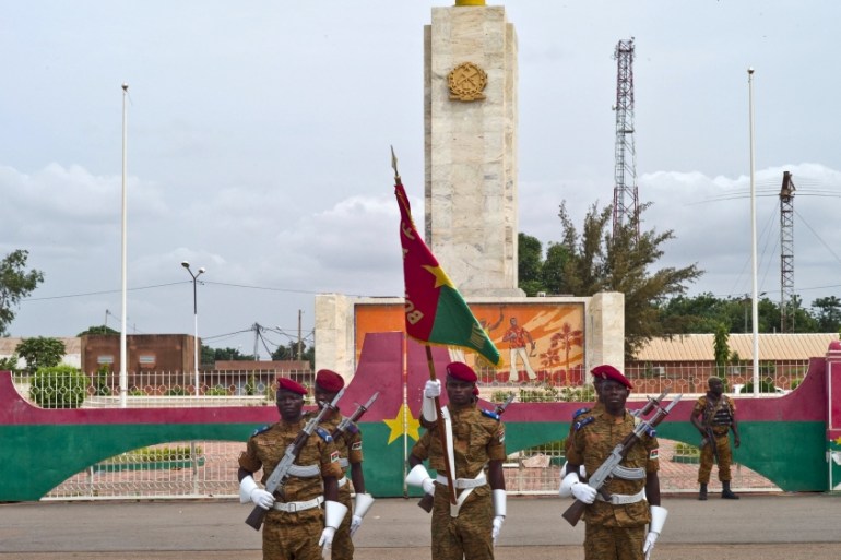 An honor guard stands during a ceremony to mark the disarming of the ex-presidential guard in Ouagadougou