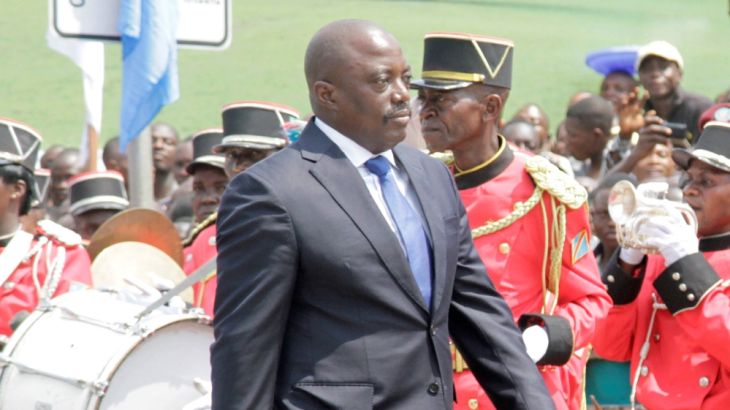 Democratic Republic of the Congo''s President Joseph Kabila inspects a guard of honour during the anniversary celebrations of CongoÕs independence from Belgium in Kindu