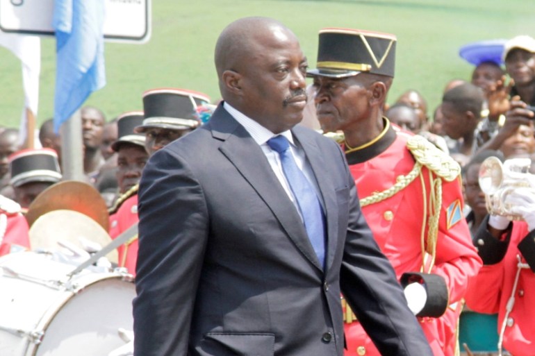 Democratic Republic of the Congo''s President Joseph Kabila inspects a guard of honour during the anniversary celebrations of CongoÕs independence from Belgium in Kindu