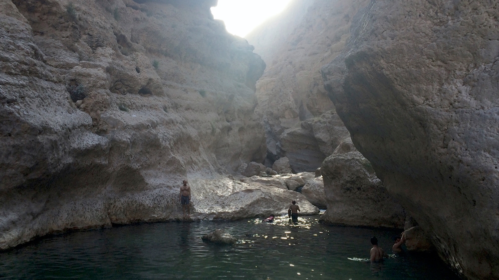 Swimming and hiking in Wadi Al Shaab are popular among locals and expats [Baba Umar/Al Jazeera]