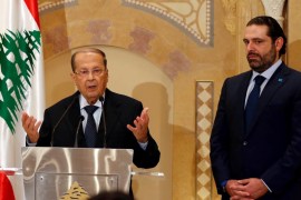 Michel Aoun during a news conference next to Lebanon''s former prime minister Saad al-Hariri in Beirut, Lebanon [REUTERS]