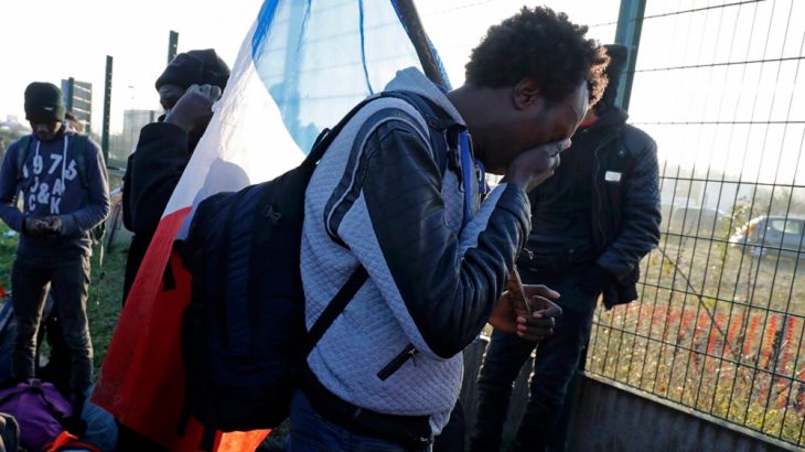 Refugee weeps as Calais camp dismantled