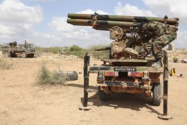 A Djiboutian soldier, part of the African Union Mission in Somalia, works with an artillery at the contingent''s base near Buula Burde