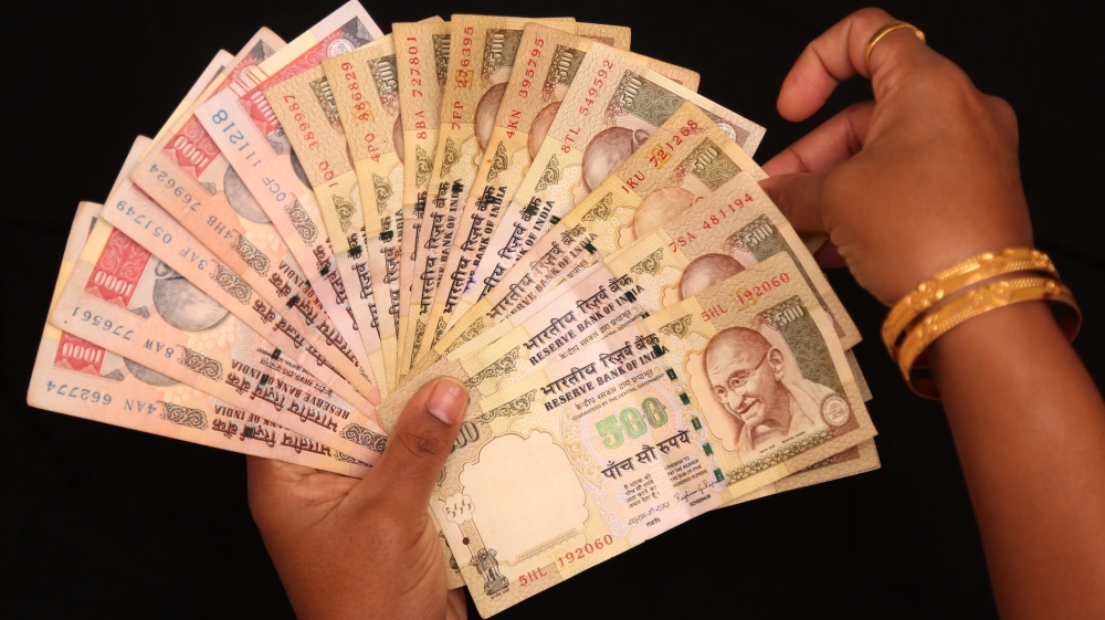 Customers will be able to exchange their old rupee bank notes for new ones [EPA]