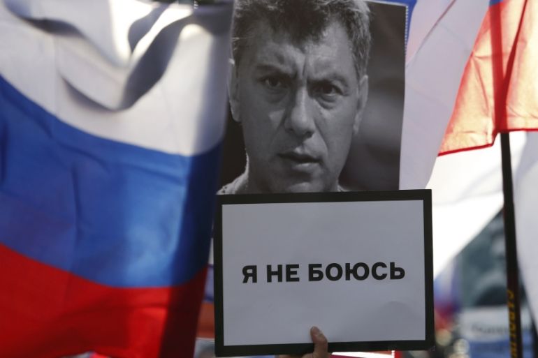 People commemorate Russian opposition politician Nemtsov on first anniversary of his murder in Moscow