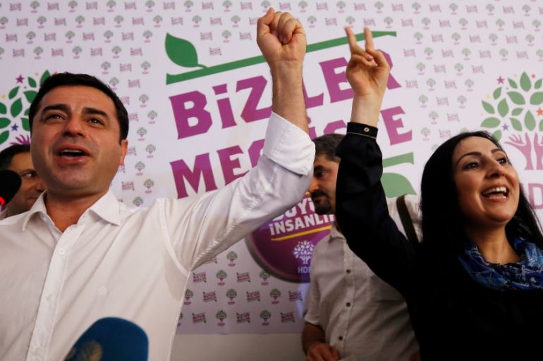File photo of co-chairs of the pro-Kurdish HDP, Demirtas and Yuksekdag, celebrating election results during a news conference in Istanbul