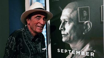 Human rights icon Albie Sachs in front of his son's family name - September. 'They weren't just slaves, they were freedom fighters,' Sachs said [Peter Lind/Al Jazeera]