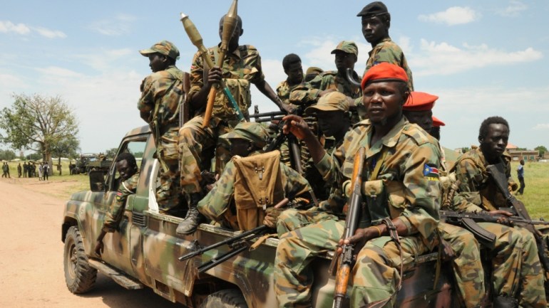 Sudan People''s Liberation Army (SPLA) forces patrol the camp of Lalo, close to Malakal, South Sudan