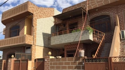 Newly built homes attempt to mimic traditional architecture in Sulaimania, Iraq [Tanya Goudsouzian/Al Jazeera]