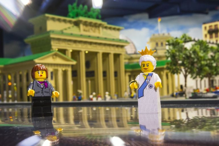 Lego figures representing Britain''s Queen Elizabeth II and German Chancellor Angela Merkel