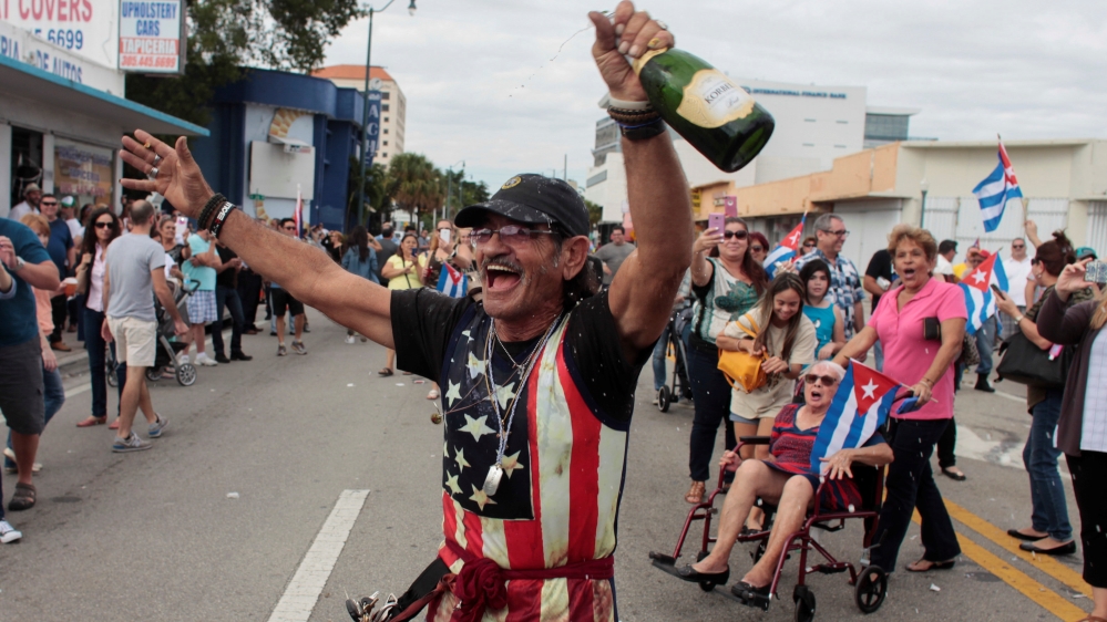 Cuban Americans celebrate Castro's passing in Miami's Little Havana district [Javier Galeano/Reuters]
