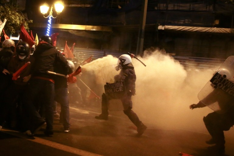 Athens - Protesters clash with riot police during a demonstration against the visit of U.S President Barack Obama, in Athens