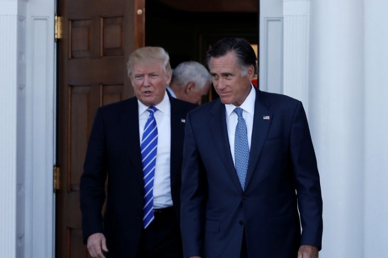 U.S. President-elect Donald Trump and former Massachusetts Governor Mitt Romney emerge after their meeting at the main clubhouse at Trump National Golf Club in Bedminster