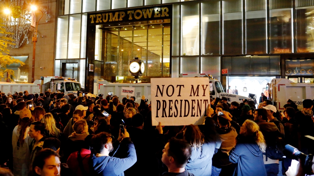 Protesters reach Trump Tower as they march in Manhattan, New York [Eduardo Munoz/Reuters]