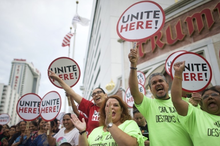 Some of estimated 2,000 union workers from the mid-Atlantic rally on the boardwalk in front of the Trump Taj Mahal Casino before a march in Atlantic City New Jersey