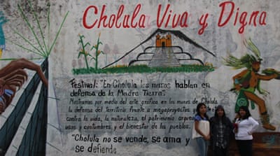 Activists from protest group Cholula: Viva y Digna [Alive and Dignified]. From left to right: Maria Refugio Paisano Rodriguez, Tania Romero Castillo and Xochitl Flores Herrera [Photo courtesy of Ryan Mallett-Outtrim]