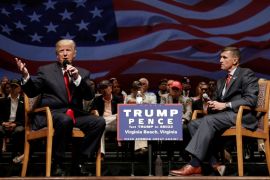 Republican presidential nominee Donald Trump speaks along side retired U.S. Army Lieutenant General Michael Flynn during a campaign town hall meeting in Virginia Beach, Virginia