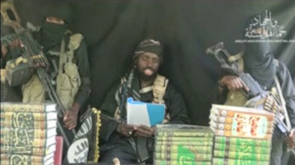 The purported leader of Nigerian armed group Boko Haram Abubakar Shekau appears at an unknown location in a video posted online [File: Reuters]