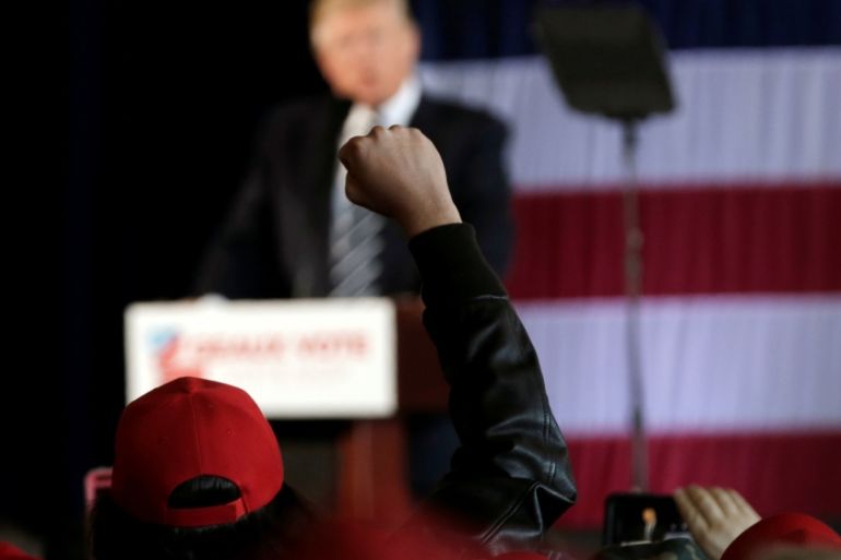 A supporter of U.S. President-elect Trump gestures during a "Thank You USA" tour rally in Baton Rouge