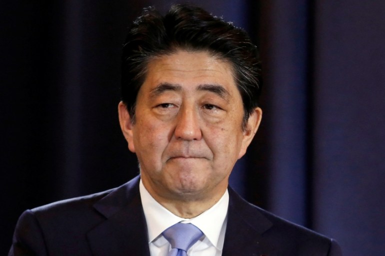 Japanese PM Shinzo Abe gestures during a press conference in Buenos Aires, Argentina