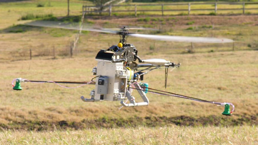 
Robotic helicopter spraying aquatic weeds in Pitt Town [Photos courtesy of ACFR  ]  
