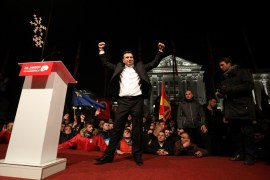 The leader of the opposition Social Democratic Union of Macedonia (SDSM) Zoran Zaev celebrates with supporters during parliamentary elections in Skopje