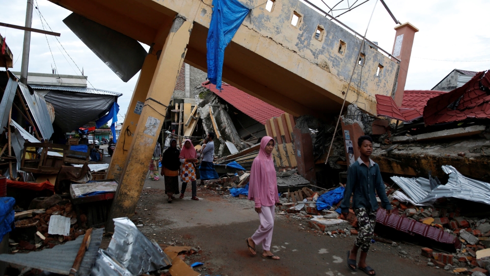 Rescue teams have flocked to the Aceh province to search for survivors [Reuters]