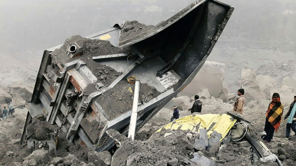 It is still unclear how many are still trapped under the debris after a part of the mine collapsed [AFP]