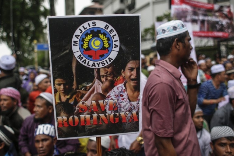 Malaysian activists and Myanmar ethnic Rohingya Muslims protest in front of the Myanmar Embassy in Kuala Lumpur