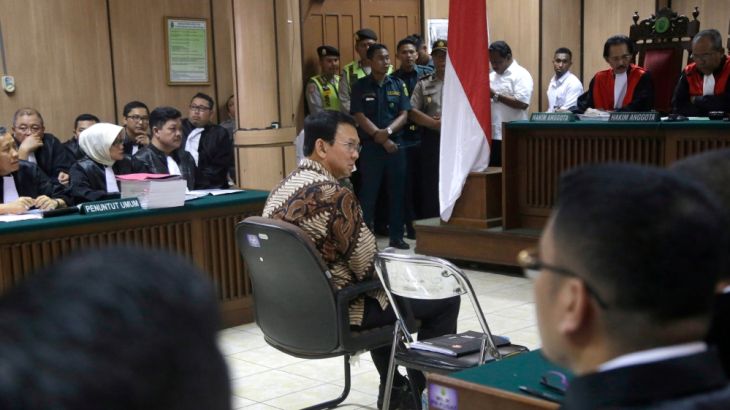 Jakarta Governor Basuki Tjahaja Purnama, popularly known as "Ahok", sits on the defendant''s chair at the start of his trial hearing at North Jakarta District Court in Jakarta