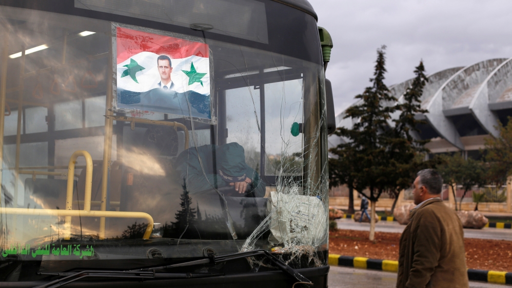 Buses evacuating people from rebel-held eastern Aleppo were allegedly turned around by Shia militias [Omar Sanadiki/Reuters]