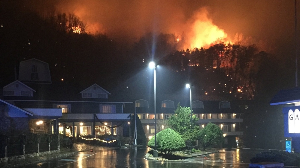 A wildfire burns on a hillside after a mandatory evacuation was ordered in Gatlinburg, Tennessee in a picture released November 30, 2016 [Reuters]