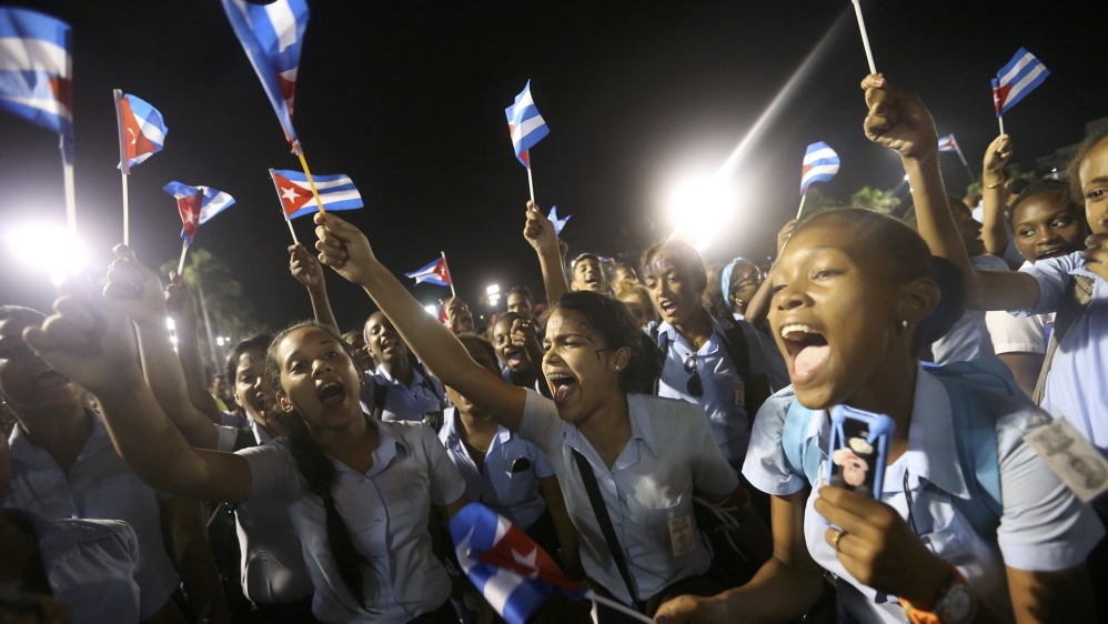 Students cheered at President Raul Castro's tribute to the former Cuban leader in Santiago [Edgard Garrido/Reuters]