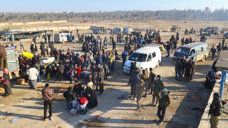 Evacuees from a rebel-held area of Aleppo arrive at insurgent-held al-Rashideen